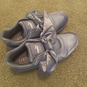 Slightly worn authentic Fenty Bow Puma shoes . They are considered rare .